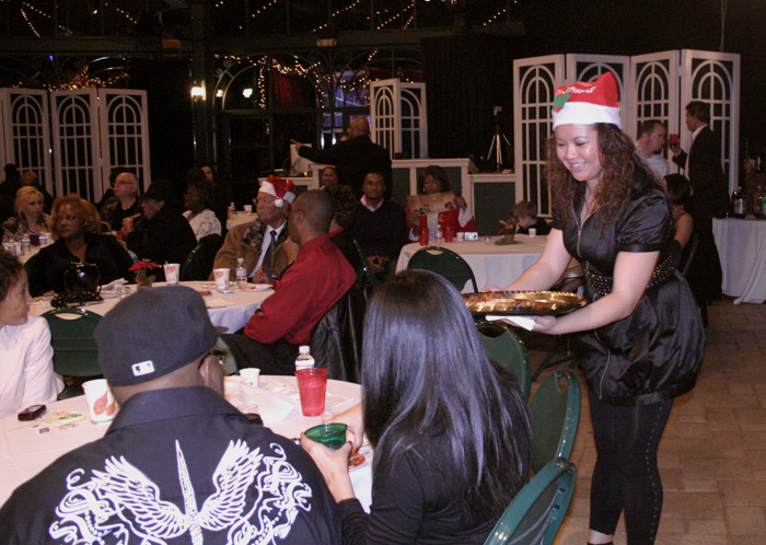 Sweeney Mae helping serve food at the Celebrity Toy Drive Event in Beverly Hills.